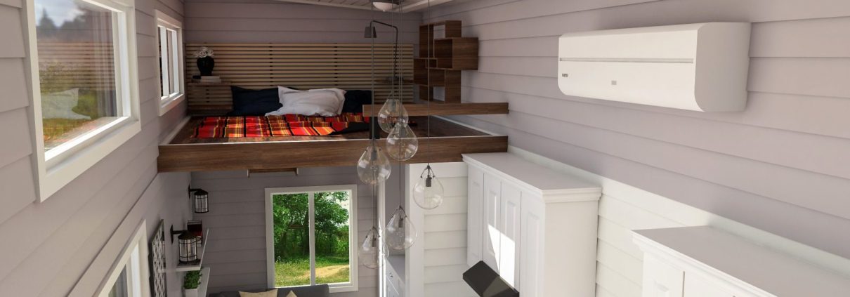 View from a small home's sleeping loft toward the living area below